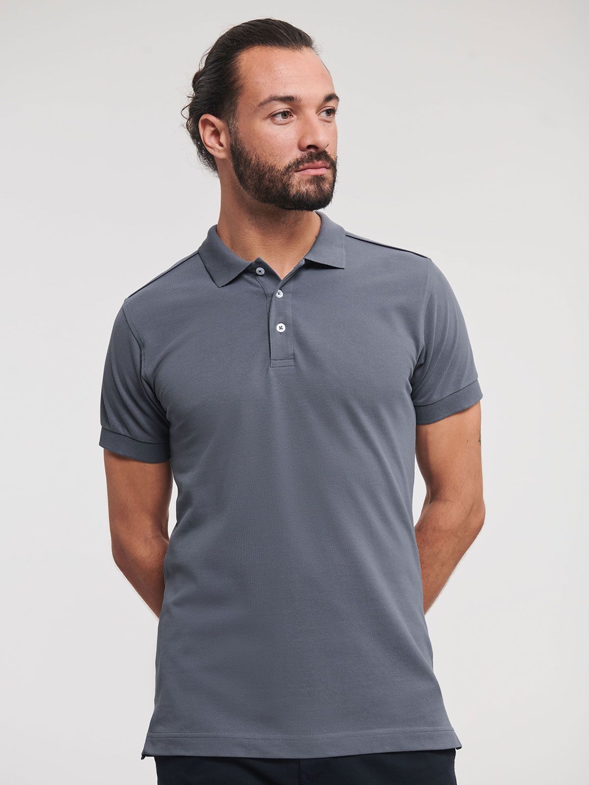 Polo masculina ajustada e elástica